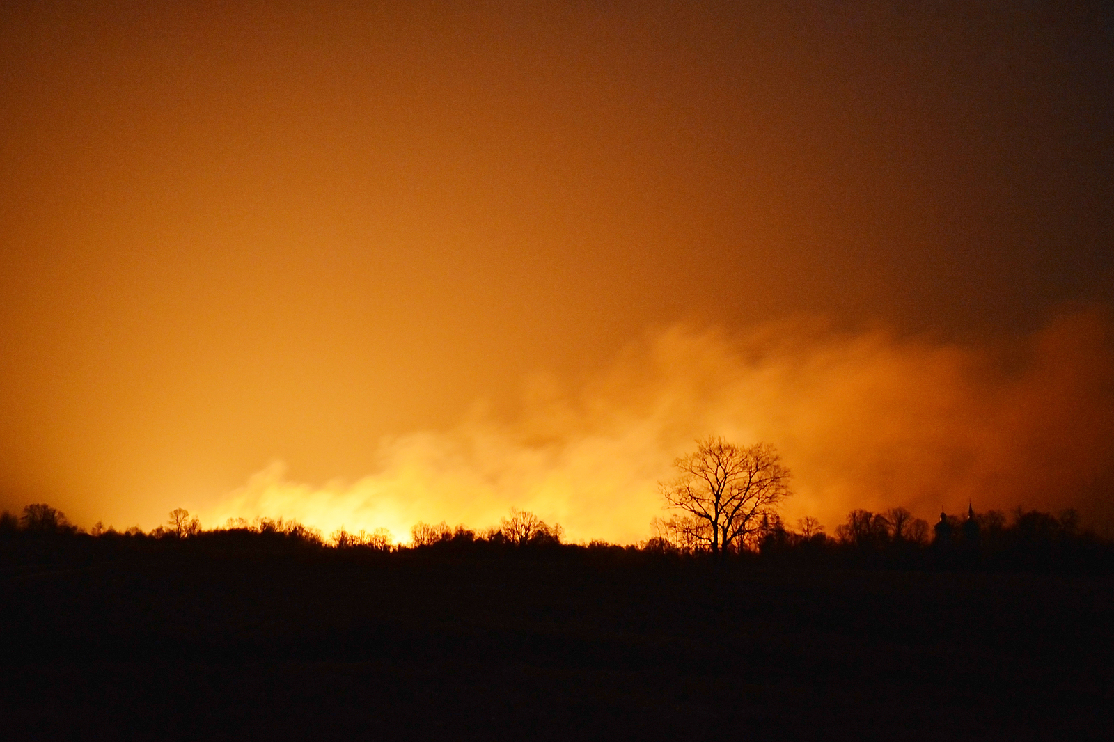 Wildfire burns at night