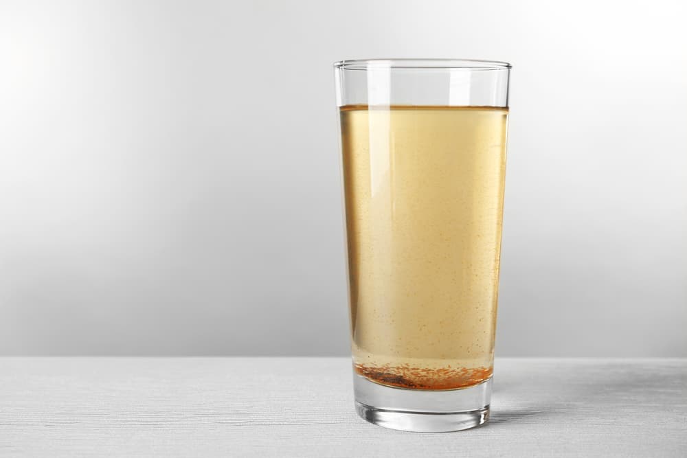 glass of contaminated water