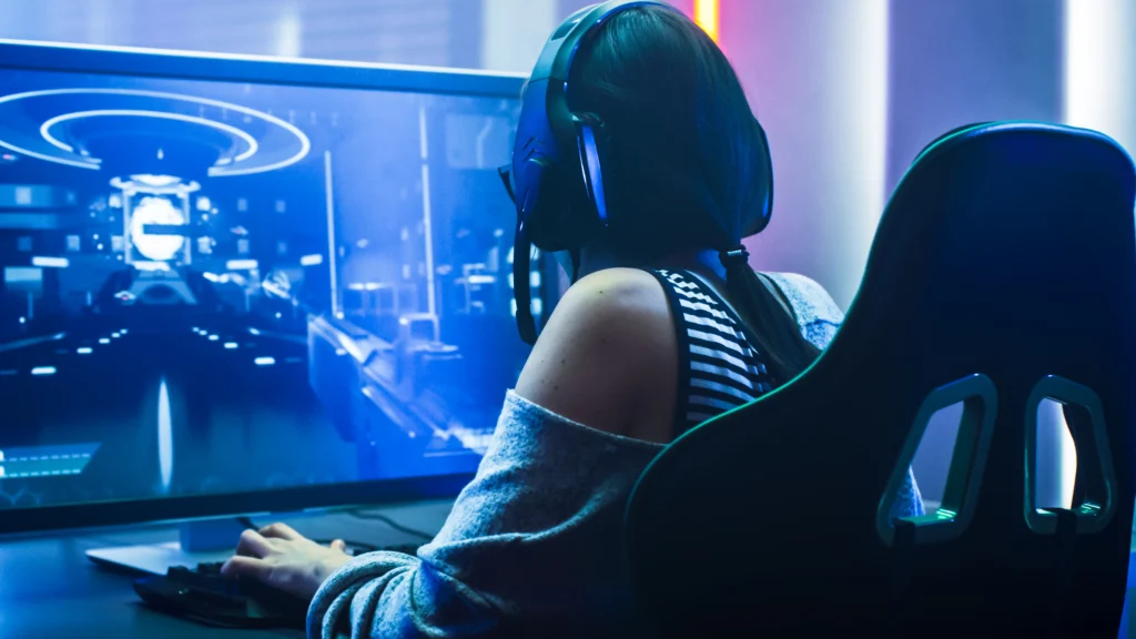 teen girl playing computer video game - Video Game Addiction Lawsuits - Lawsuit Legal News 